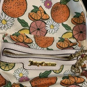 Juicy couture backpack purse good condition hardly ever use very soft leather.